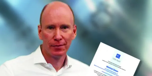 Mr Simon Receives the IEC 1906 Award 2022